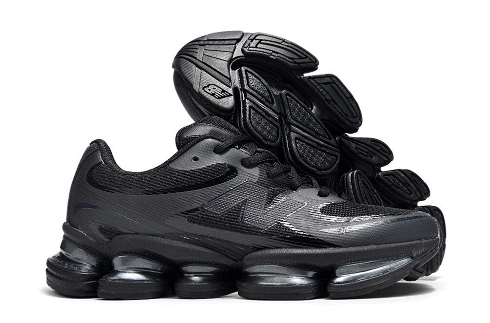 New Balance 2000 – Triple Black Cushion-Pod Runner